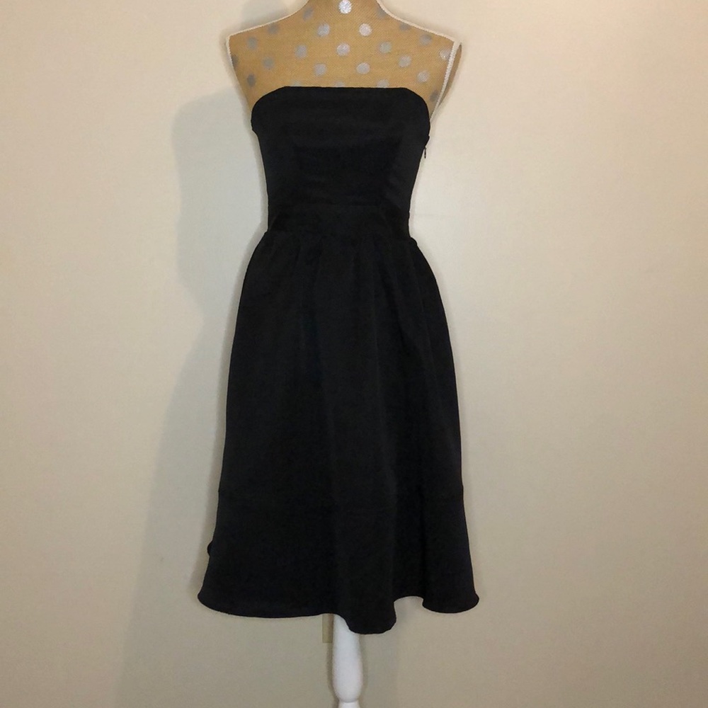 Express strapless little black dress with pockets.